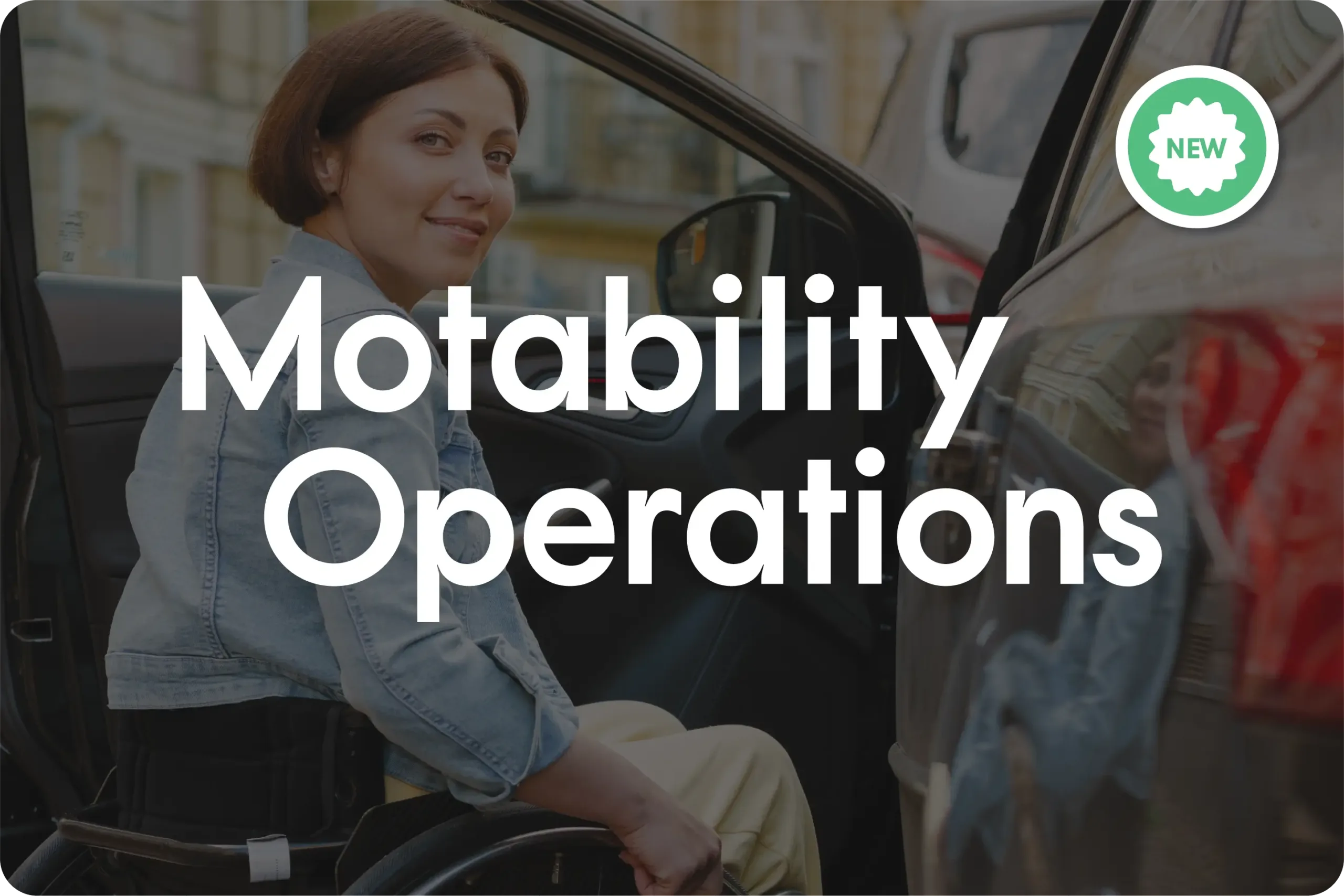 Motability Operations logo on black background of wheelchair user and car